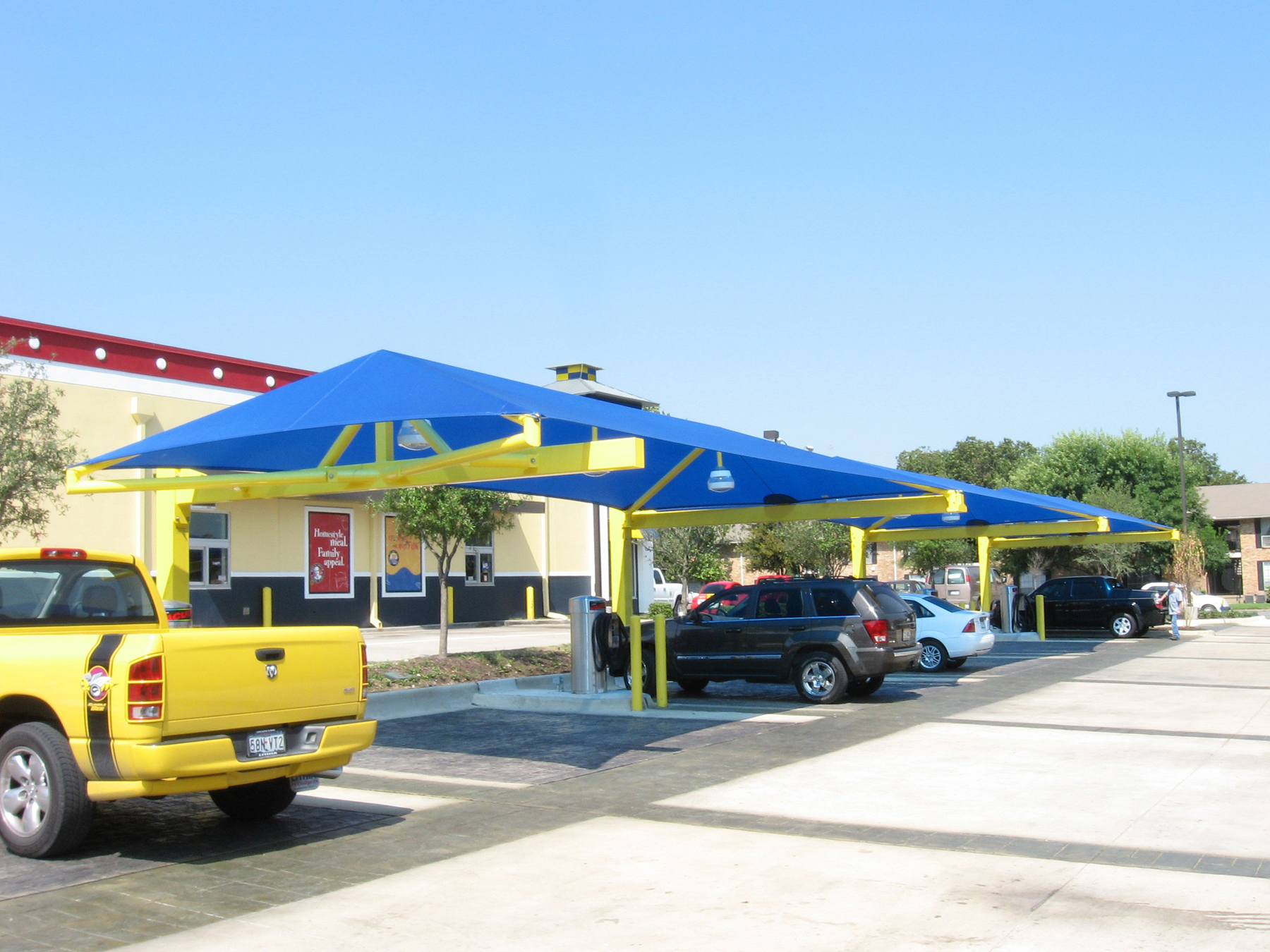 Modern cantilever car shade design for a residential property in Kenya