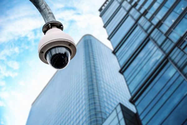 security-camera-with-glass-building-background-1-768x513 security-camera-with-glass-building-background-1-768x513